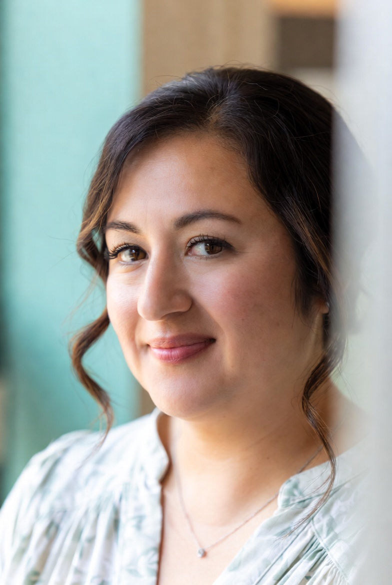 Portrait of Grace Lind, patient experience director, in a calm refined setting